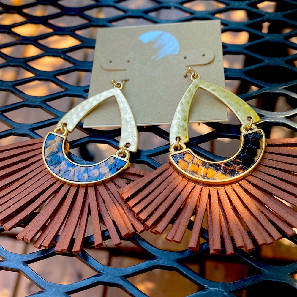 Really cute brown with some snake skin look leather with gold earrings